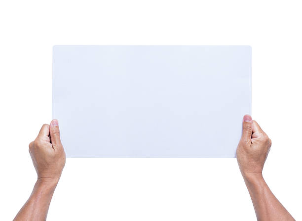 istock Hands holding blank paper isolated on white background 537489841