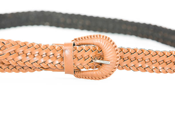 istock weave brown women leather belt isolated on white 537497461
