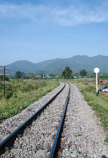 istock Single railway track in Thailand countryside. 537497467