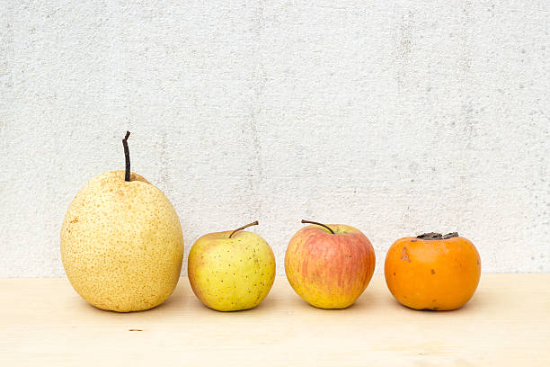 fruit group still life on plywood and concrete wall