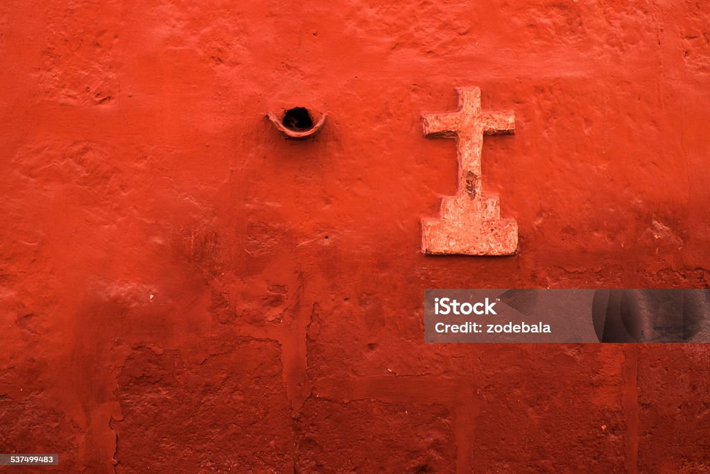 Cross on a Red Wall Cross on a red wall 2015 Stock Photo