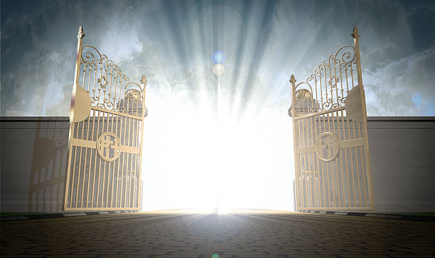 Heavens Gates Opening A depiction of the pearly gates of heaven open with the bright side of heaven contrasting with the duller foreground gate stock pictures, royalty-free photos & images
