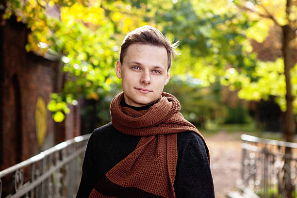 istock young man  in autumn park 537502025