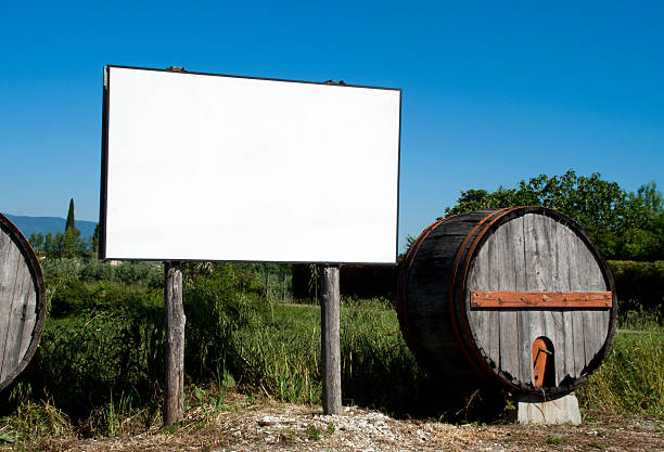 istock wooden barrels and billboard 537506094