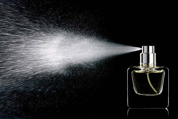 perfumy  - spraying water zdjęcia i obrazy z banku zdjęć