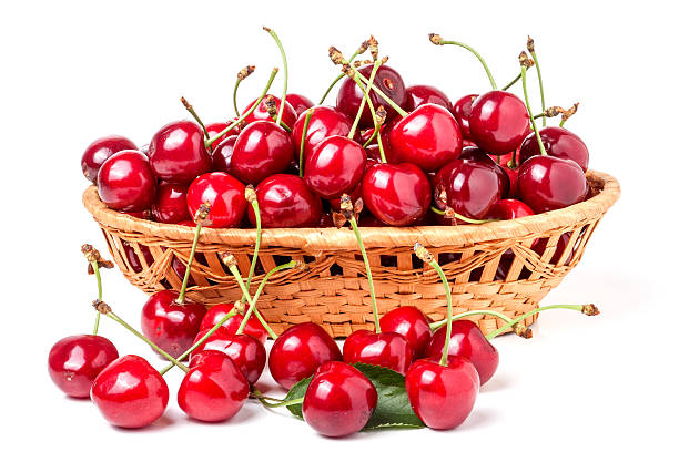 istock cherries in a wicker basket isolated on white background 537508070