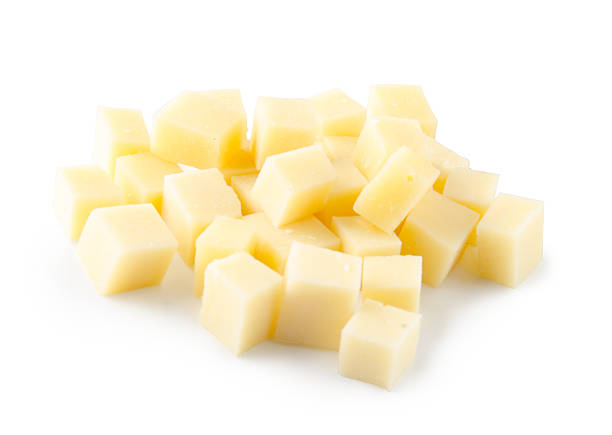istock Cubes of cheese on white background. Top view. 537509402