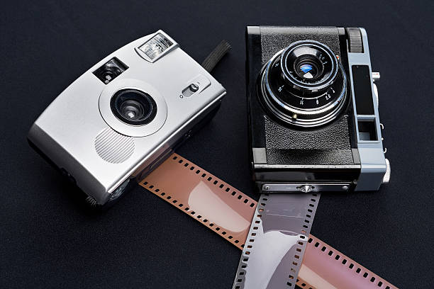 istock Two vintage rangefinder camera and photographic film 537511576