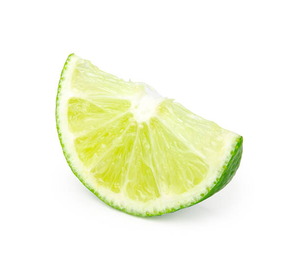 istock sliced lime isolated on white background with clipping path 537512688