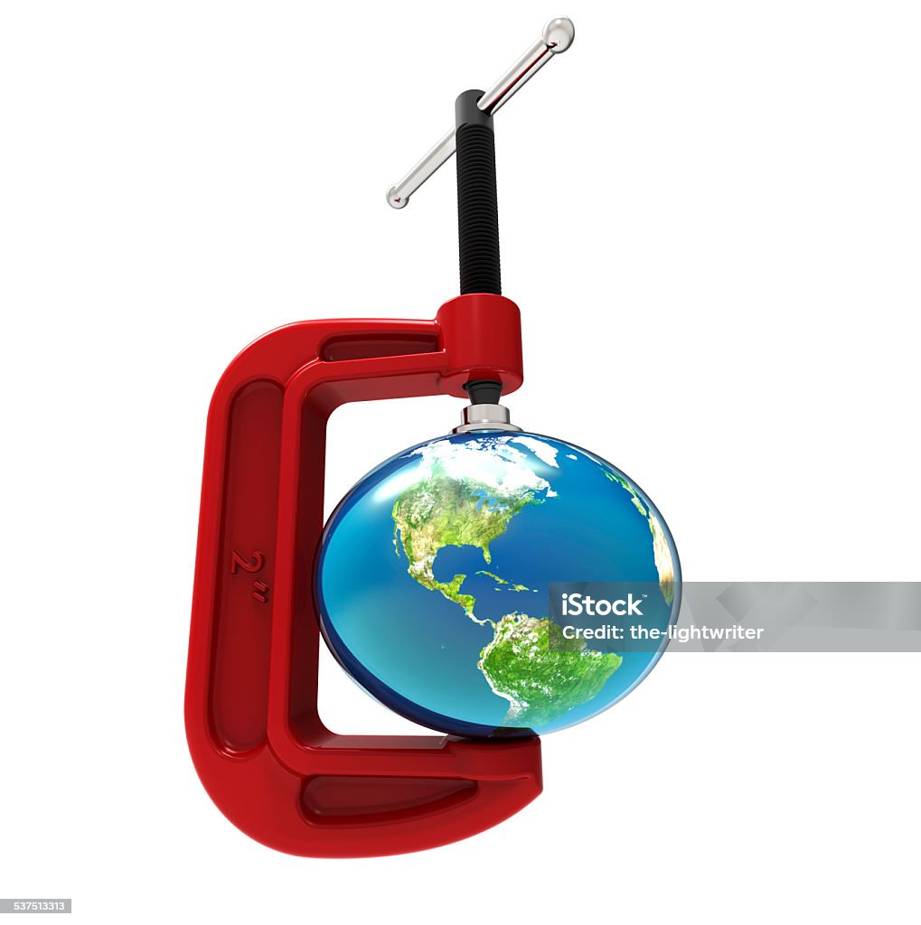 earth onder pressure The earth being pressured by a G-clamp. 2015 Stock Photo