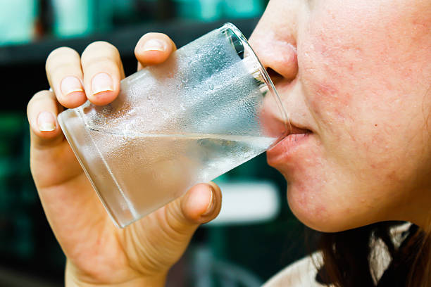 istock asian woman drinking water 537514005
