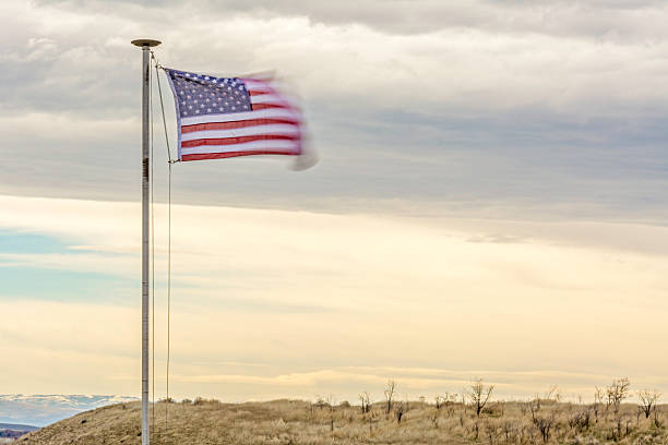 istock American flag blows in the wind 537514181
