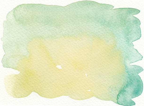 istock faded green yellow abstract wet watercolor background 537515162