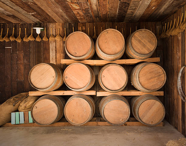 closeup of oak barrels in vineyard with copy space