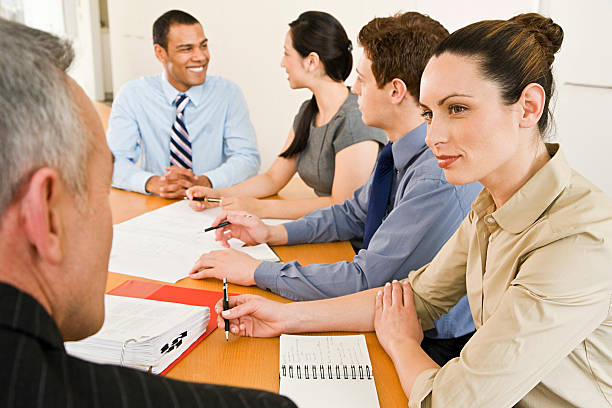 istock Five businesspeople in a meeting 537516123