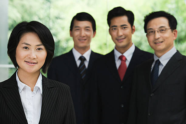 istock Four chinese businesspeople 537516163