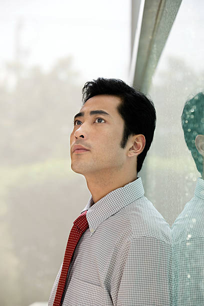 istock young chinese businessman 537516219