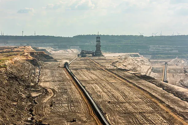 Large machinery digging for brown-coal in of the world's deepest open-pit mines in Hambach in the Ruhr area in Germany.