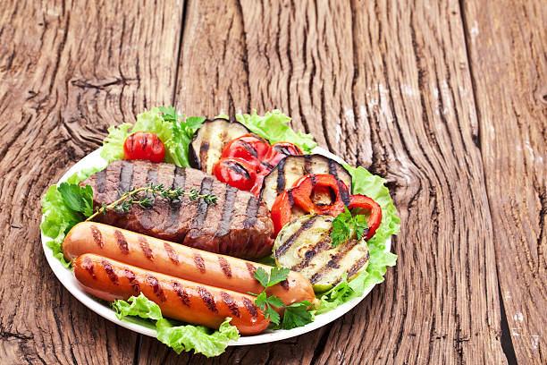 istock Grilled steak,sausages and vegetables. 537518233