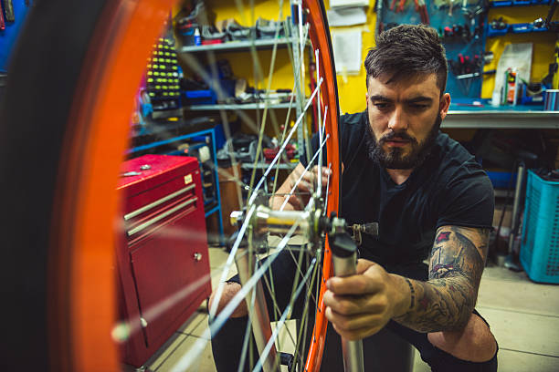 istock Repairing a bike 537522214