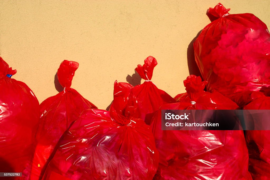 Group Of Red Garbage Bags Stock Photo - Download Image Now - Bag