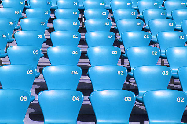 istock Blue Tribune Seats in a stadium - front view 537524172