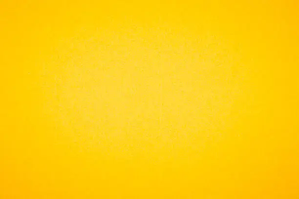 Photo of Yellow textured paper background
