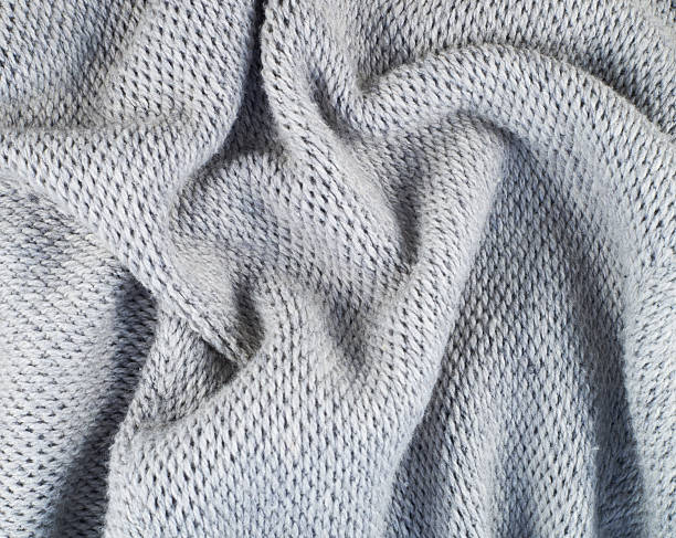 istock Fragment of a knitted gray cloth 537525566