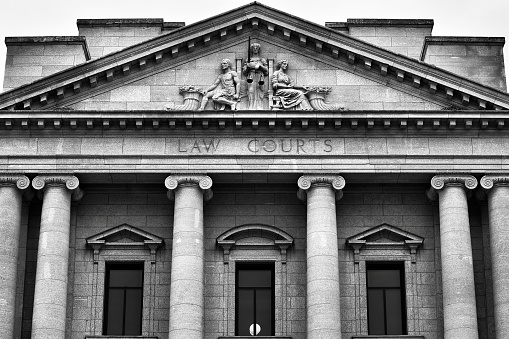 Image featuring the Provincial Law Courts Building from Winnipeg, Manitoba.  Monochrome image.