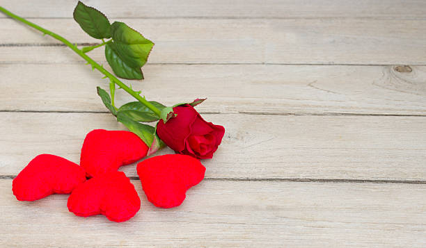 istock love,Heart and rose on wood 537532107