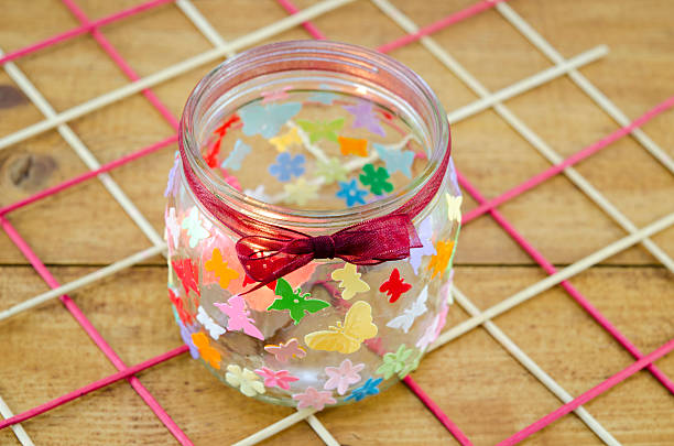 istock DIY candleholder on a wooden table 537532207