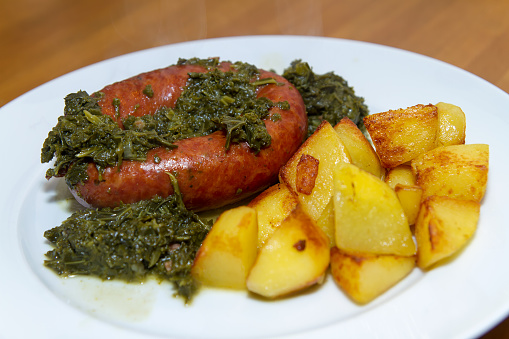 Kale with sausage and potatoes