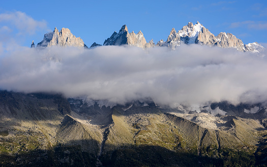 From left to right: Aiguille des Grands Charmoz (3445 m) and Aiguille du Grépon (3482 m), Aiguille de Blaitière (3522 m), Aiguille du Plan (3673 m). Taken from the Grand Balcon Sud at an altitude of about 2000 m (Mont Blanc Massif, France).