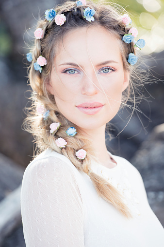 Very natural Beauty Portrait of a gorgeous Bride with Flowers in her Hair. Converted from RAW. Nikon D810.