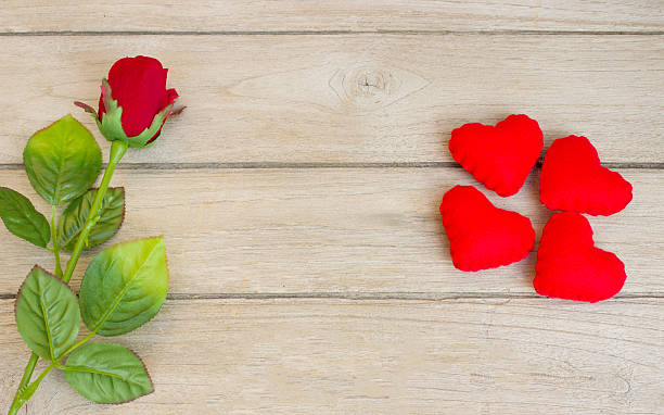 istock love,Heart and rose on wood 537534537