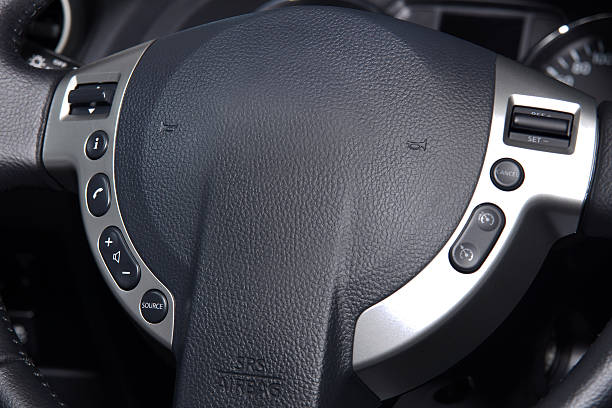 istock steering wheel with audio control and cruise control 537534639