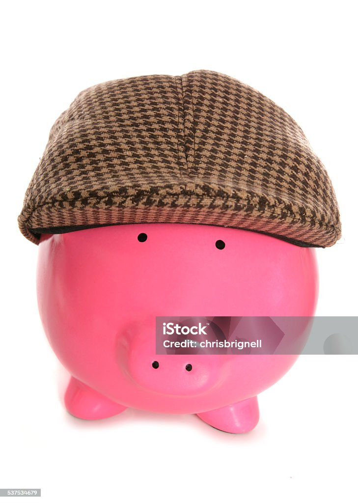 piggy bank wearing flat cap piggy bank wearing flat cap cutout Cap - Hat Stock Photo