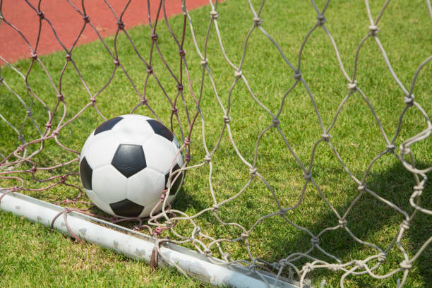 istock Soccer ball in the goal after shooted 537536461