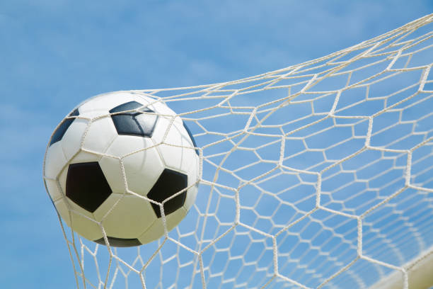 istock Soccer ball in the goal after shooted 537536463