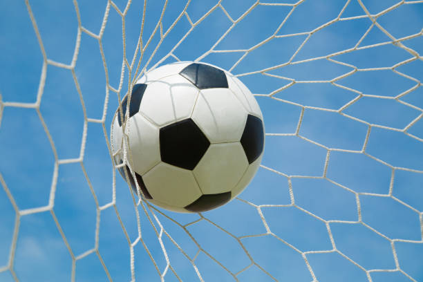 istock Soccer ball in the goal after shooted 537536467