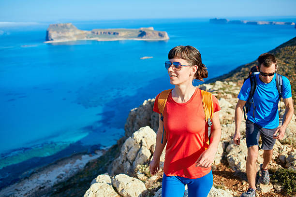 istock travelers with backpacks 537536924