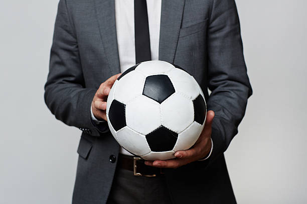 istock Emloyer with soccer ball 537536930
