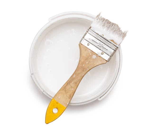 istock Can of white paint with brush 537538196