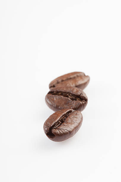 istock Close up of Three roasted coffee beans 537538545