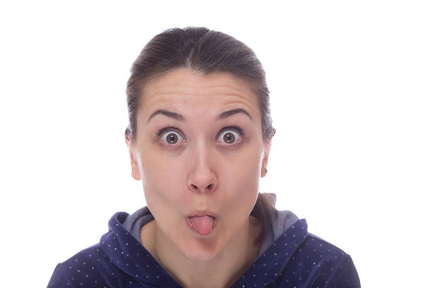 istock Woman showing her tongue isolated 537539258