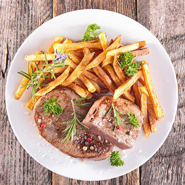 istock grilled beef and french fries 537539288