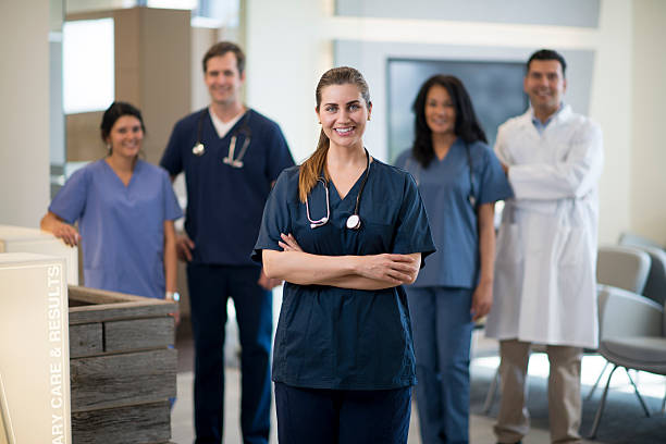 istock A multi-ethnic group of nurses and doctors are standing 537540106