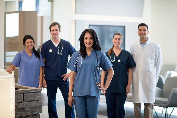 istock A multi-ethnic group of nurses and doctors are standing 537540166