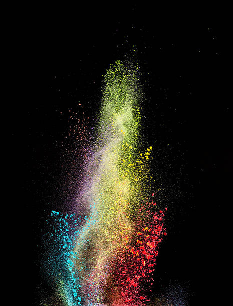 istock Explosion of colored powder on black background 537541222