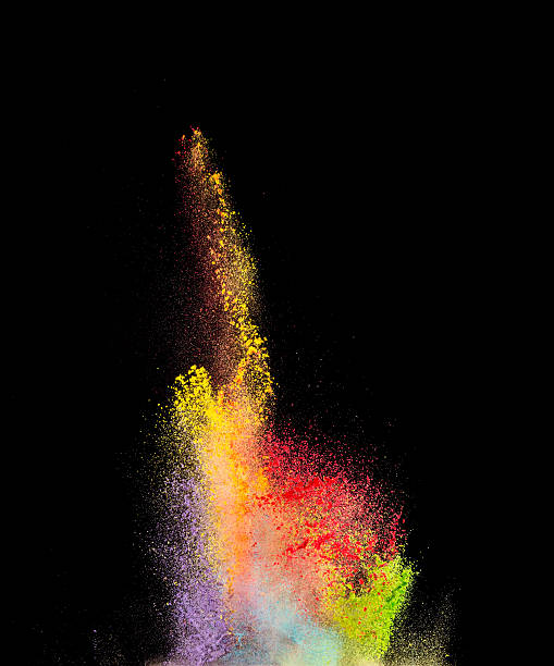 istock Explosion of colored powder on black background 537541842